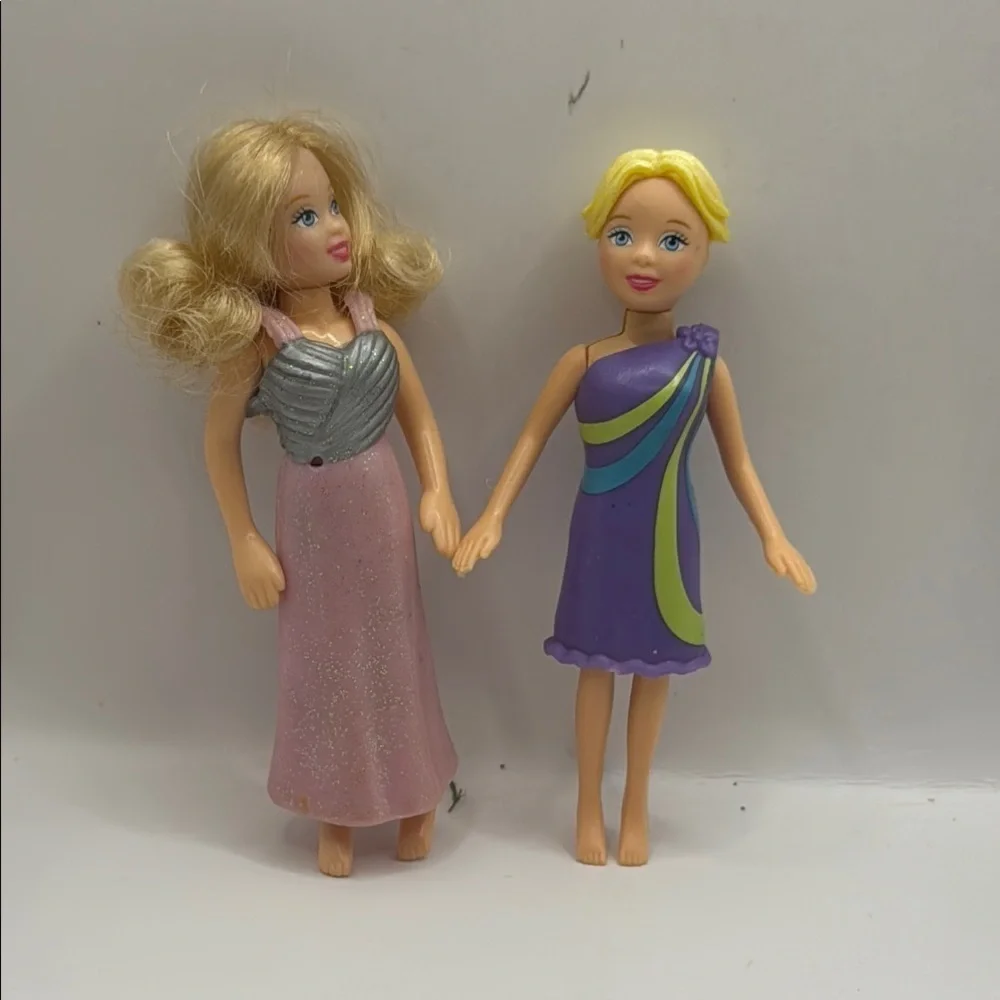 Polly pocket Doll Set with  extra Pink and Purple Dresses
